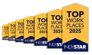 TWP Stacked 2025 even "Top Workplaces" awards from IndyStar arranged in a row, showing consecutive years from 2019 to 2025, with the largest and most prominent award labeled 2025 in front.